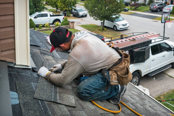 Professional Roof Replacement technician working in Marble Falls, TX